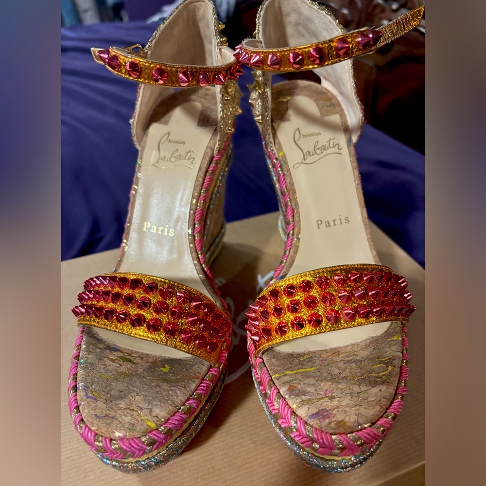 A perfect pair of CHRISTIAN LOUBOUTIN WEDGE HEELS